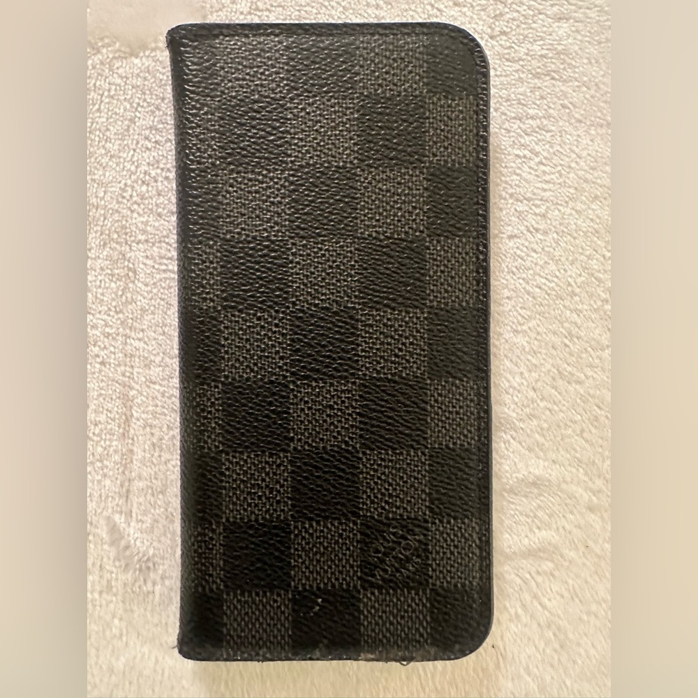 Louis Vuitton phone case. See measurements